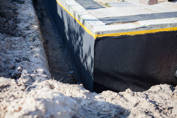 Professional Emergency Waterproofing technician working in Richmond, MI